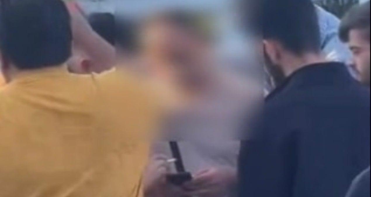 16 yaşındaki kızın fotoğrafını çekerken yakalandı! Meydan dayağından kaçamadı